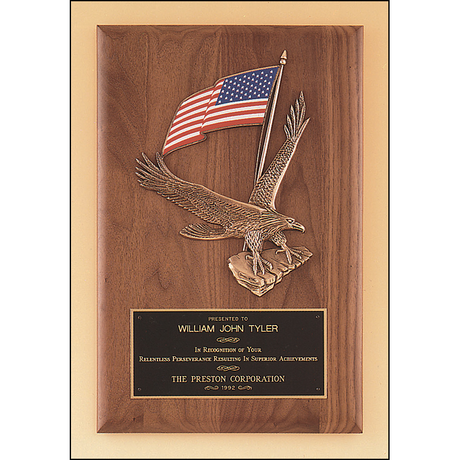 Solid American walnut plaque with a large eagle and American flag casting.