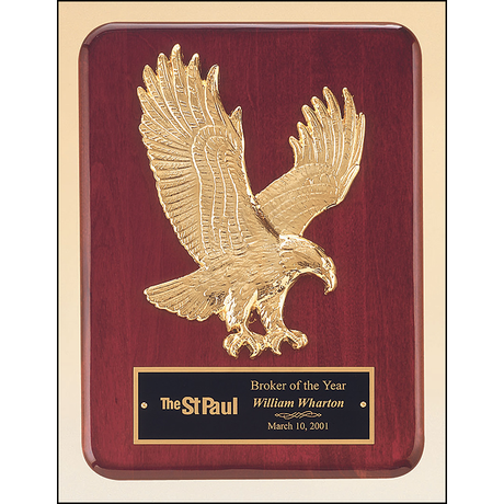 Rosewood stained piano finish plaque with goldtone finish sculptured relief eagle casting.