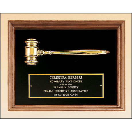 American walnut frame with a gold electroplated metal gavel on choice of velour backgrounds.