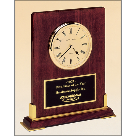 Desktop clock rosewood stained piano finish wood with gold metal accents.