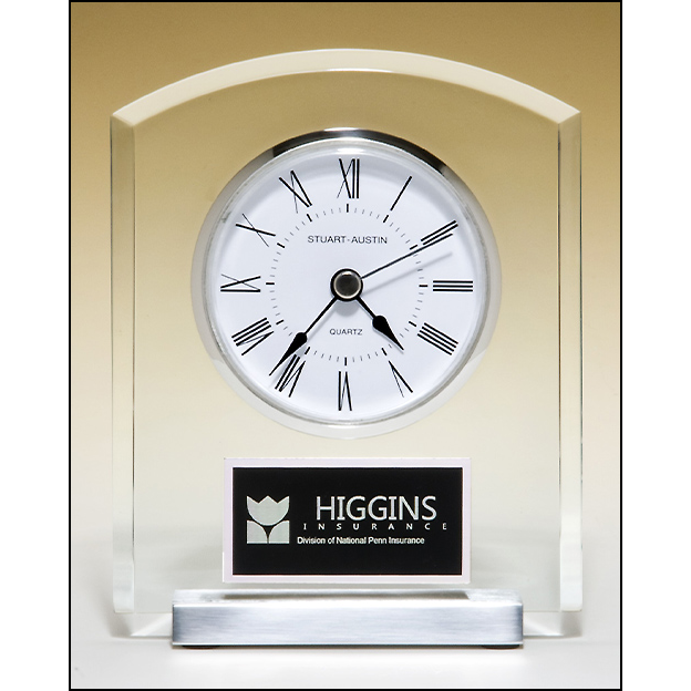 Acrylic clock with polished silver aluminum base. Silver bezel, white dial, three-hand movement.