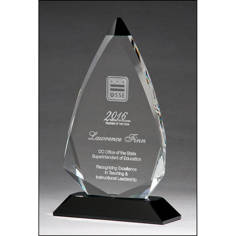 Arrow shaped crystal award with black accent on black crystal base.