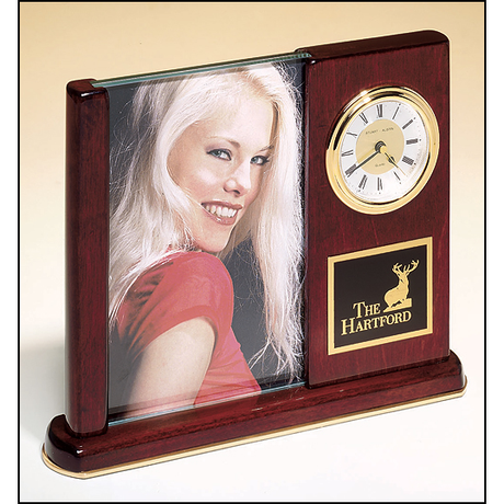 Rosewood stained piano finish desk clock with glass picture frame.