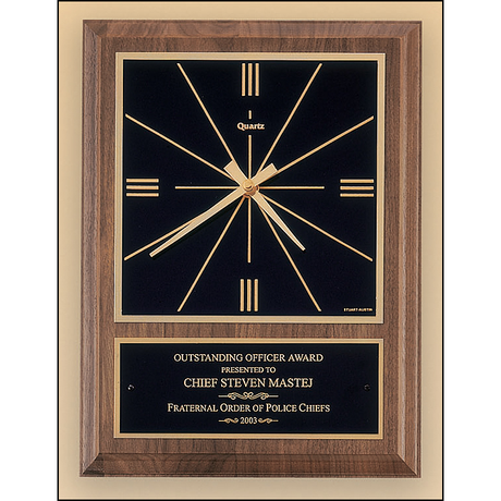 American walnut vertical wall clock with square face.