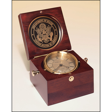 Captain's Clock with solid brass clock housing in a hand rubbed mahogany-finish case.