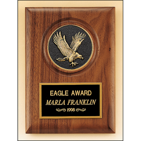 American walnut plaque with a finely detailed black and gold eagle medallion.