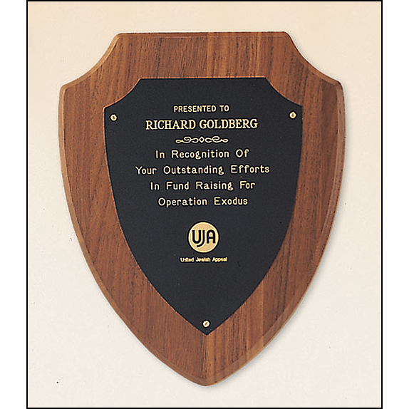 American walnut plaque with a black brass plate.
