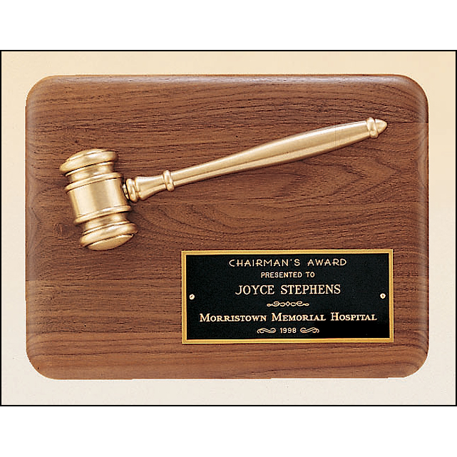 American walnut plaque with an antique bronze gavel casting.