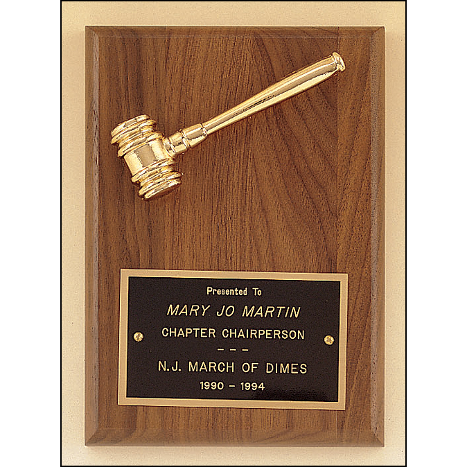 American walnut plaque with a goldtone metal gavel.